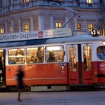 Red old trolley car in Vienna in the first District by night